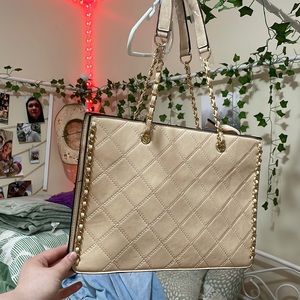 never used (still tags) tan purse